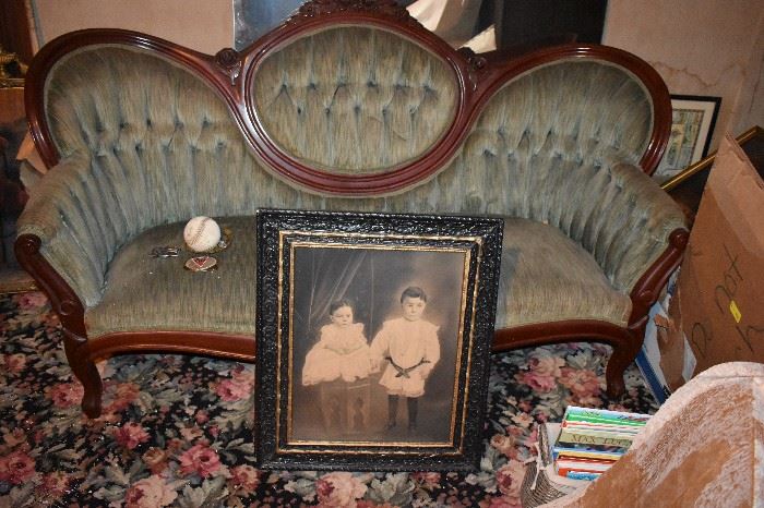 Antique Victorian "tufted" back Sofa with Antique Framed Painting of Children