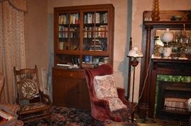 Antique Hutch with Books and many other items Plus Antique Chairs in the Foreground