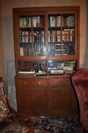 Antique Hutch with Books and many other items Plus Antique Chairs in the Foreground