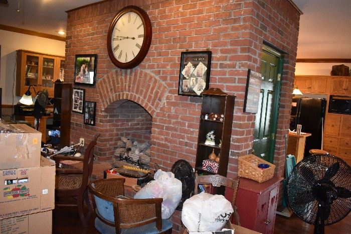 Many Undiscovered Items in this Picture featuring a Beautiful Red Brick Double Fireplace