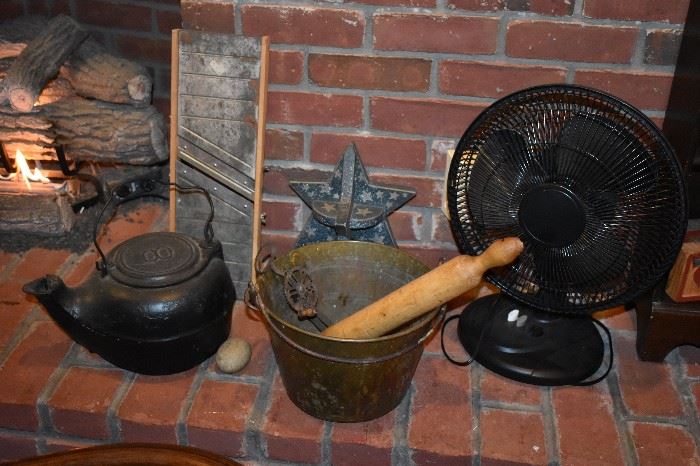 Antiques and Collectibles: Cast Iron Tea Pot, Brass Bucket, Egg Beater, Rolling Pin, Cabbage Slicer and Electric Oscillating Fan