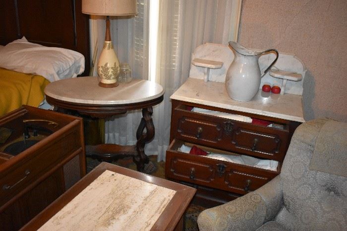This Bedroom is filled with Antique Furniture including: the Highly Carved Bed with Matching Marble Topped Dressers and Matching Wardrobe to Marble Topped Table to Marble Topped Dry Sink to Occasional/End Tables to Chairs to Bookcases to Antique Mirrors and much More!
