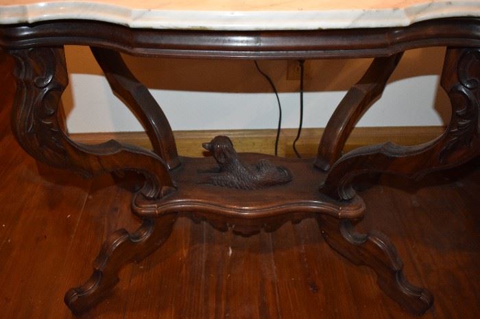 Highly Carved Antique Marble Top Table. This Table is really Special! Notice the Highly Carved Legs, but most importantly is the Artistically Carved Dog that is lying "watchfully" at the base of the Table!