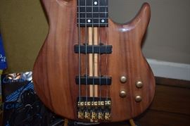 Carvin Guitar "Bunny Brunel" 5 String Bass made with Gorgeously Finished KOA Wood. Has Original Case and Carvin Amplifier/Equalizer is also for sale