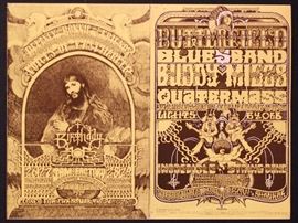 Butterfield Blues Band/Buddy Miles/Quartermass/Incredible String Band/Ravi Shankar/Delaney & Bonnie and friends/Voices of East Harlem/Jam/Factory postcard BG-261 & 262 PC-C (Bill Graham, 1970)
Artwork by Norman Orr
For the shows on December 14, 16-20, 26-29, 1970 at the Fillmore West
Measurements: 6-15/16“ x 9-1/8“
Condition: Good.  The postcard has a crease down the center and staple holes from when the card was originally mailed out.  Corner bump on upper left side, handling wear on the crease down middle. 
This vintage piece is a double postcard sent out to a Fillmore West mailing list to advertise the Bill Graham-produced shows in December of 1970 featuring lineups that included the Incredible String Band, Ravi Shankar, the Butterfield Blues Band, Buddy Miles, Quartermass, Delaney & Bonnie & Friends, the Voices of East Harlem, Jam and Factory.  The postcard is a combination of re-sized versions of two psychedelic concert posters that were issued for the above shows.  It is the work