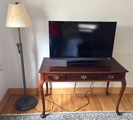 Sony Bravia Flat Screen TV, modern standing lamp, early American style desk