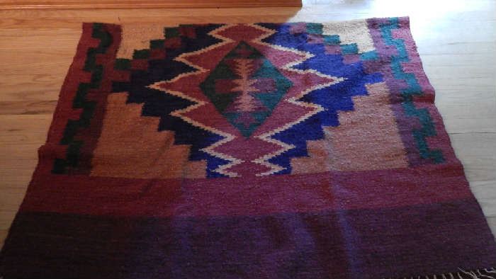 NATIVE AMERICAN RUG. 80 INCHES LONG X 57 INCHES WIDE.