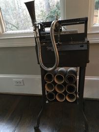 Dictaphone with stand and wax still present but fractured