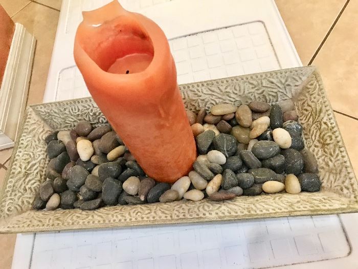 Decorative dish with stones and candle $5