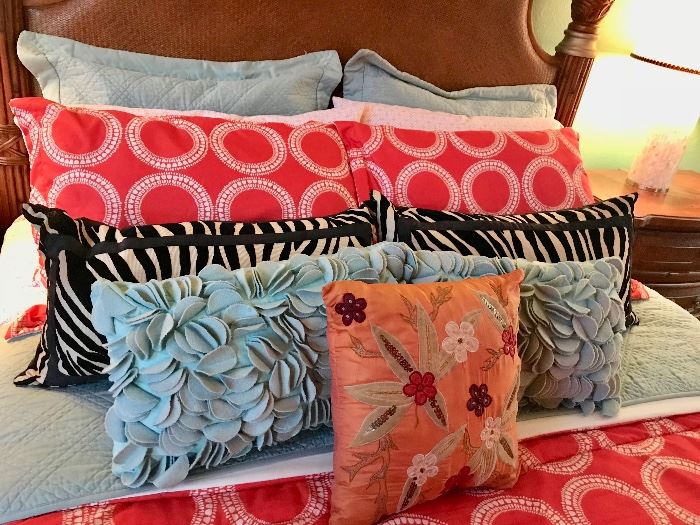 Small orange embroidered pillow $8                                           Blue scalloped pillows ($8 each)                                                     Black zebra pillows ($8 each)                                                                 Red circle pillows ($5 each) 