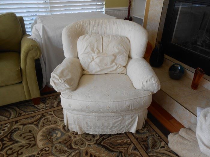 2 of 2 White on white crewel floral design on this very comfortable stuffed chair 