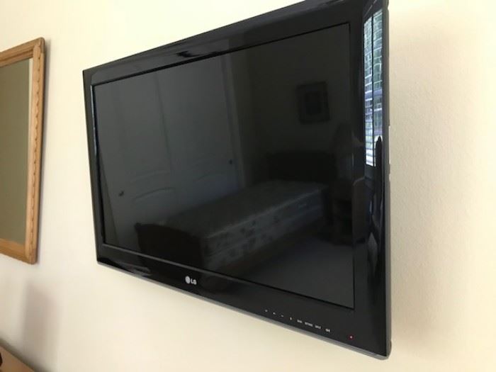 One of several wall mounted TVs  This ones LG