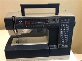 Husqvarna Model 990 with case cover, attachments and foot control