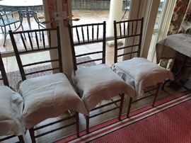 Bamboo motif chairs with linen covered cushions $80 for four - two sets available.  We also have 6 being sold in pairs for $30 a pair without cushions