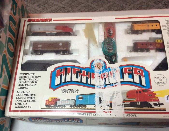 several sets of toy trains