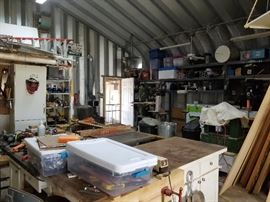 table saws, routers, blowers, drills, joiners, planner, scrap wood, work benches, caster wheels, hand tools, shop rags, vises