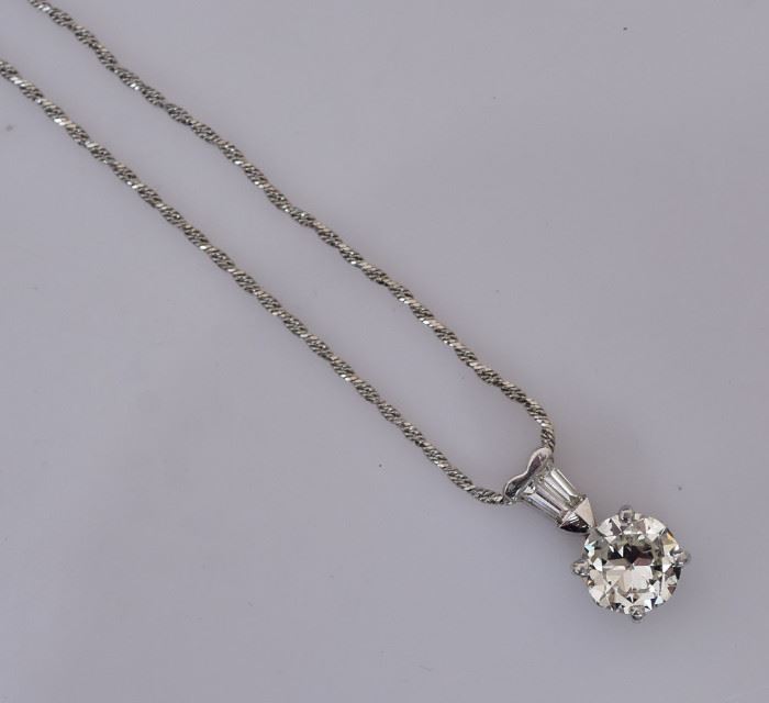 14k Gold Diamond Solitaire Pendant             Bid on-line today through March 21st at www.fairfieldauction.com