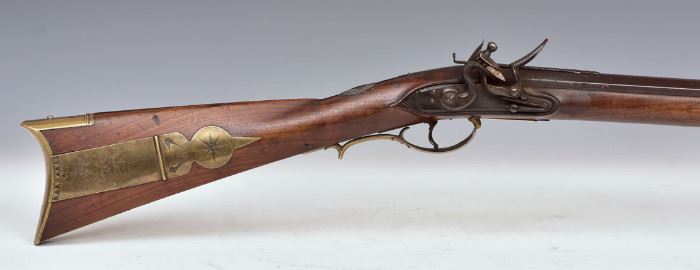 Flintlock Rifle  with engraved brass patch box
and fanciful silver string inlay to shoulder
barrel signed J. Mason, hardware stamped
Ketland, 35" long barrel, 50" long overall             Bid on-line today through March 21st at www.fairfieldauction.com