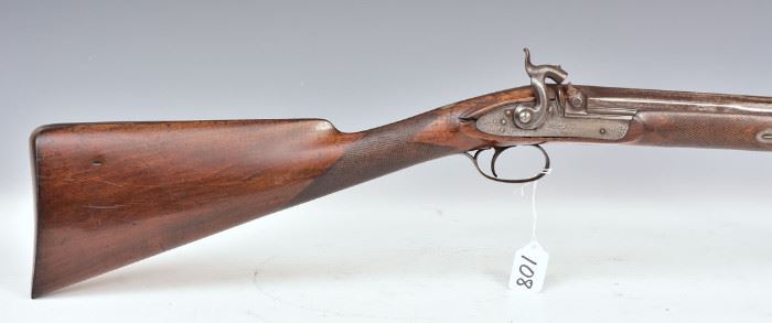Percusssion Rifle  with engraved hardware and checked stock
31 1/4" barrel, 48 1/2" long overall
mid-19th century