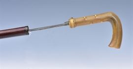 Sword Cane             Bid on-line today through March 21st at www.fairfieldauction.com