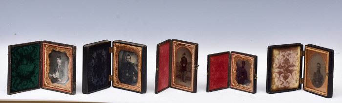 Group of 5 Cased Civil War Images including a quarter plate tinted daguerreotype of 
a soldier, and two quarter plate ambrotypes
of soldiers, one with gutta percha case and
one irregular size, and a sixth plate tinted
tintype of a Soldier with American flag             Bid on-line today through March 21st at www.fairfieldauction.com