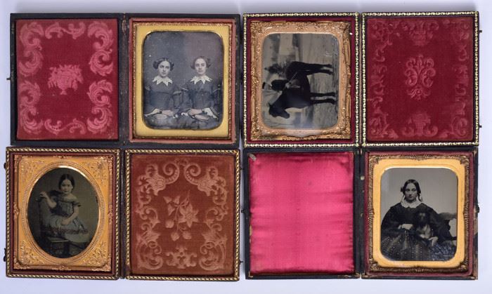 Group of 4 Cased Images  one daguerreotype of twins
and three ambrotypes including boy on
pony, girl with dog and tinted portrait of a
young girl
all quarter plate             Bid on-line today through March 21st at www.fairfieldauction.com