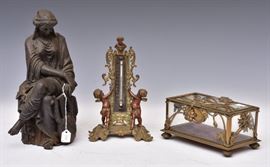 Art Nouveau Dresser Box 7" long together with Victorian cherub
thermometer, 9" high and a bronze figure
of a musician, 11 1/2" high
early 20th century             Bid on-line today through March 21st at www.fairfieldauction.com
