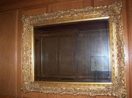 large mirror another gold framed mirror 3 times the size 