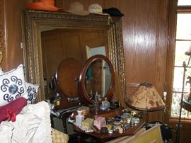 perfume bottles, collectable trinket boxes, enormous mirror, lamps, side tables, loveseat  custom bedding and so much more