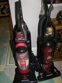 3 vacuums and a shark
