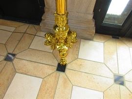 Detail of one of a pair of Brass Torchiere Lamps 