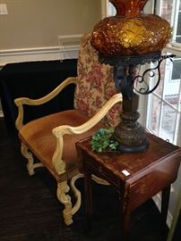 Leather and fabric arm chair; vintage lamp; small drop leaf side table