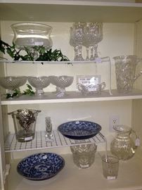 Glass serving pieces; blue & white plates