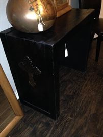 Small table with a cross on the side