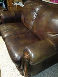 Leather loveseat (as is) has matching sofa.