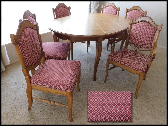  Dining room table with six beautifully upholstered chairs 66" x 43" without leafs. This set has three one foot leafs.  Purchased at Gabberts.