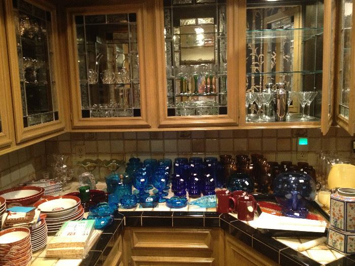 Kitchen full of beautiful glassware, fine crystal, sets of dishes