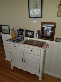White Cabinet and Framed Art