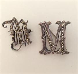 "M" pins