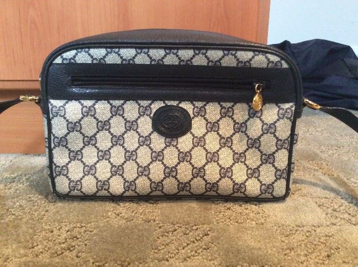 Gucci Handbag  https://www.ctbids.com/#!/description/share/7221