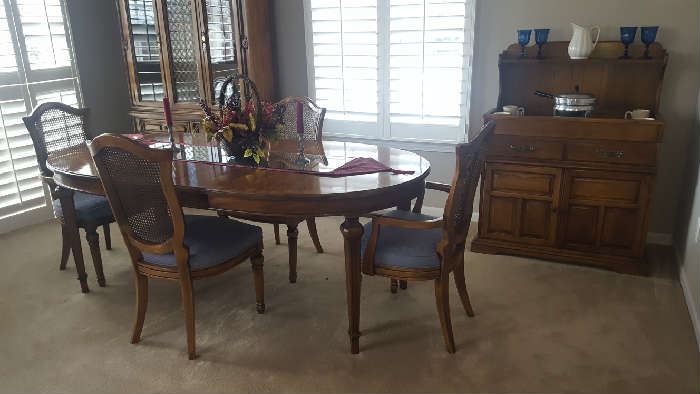 $250     Dining room table with 6 chairs, (2)   20" leaves.  Measures 60" x 42"