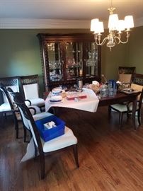 Astor Park Dining Table with two (2) leaves extends to seat 12 people comfortably. Includes custom table covers (BONUS).  PRICED TO SELL - Table, Chairs, Cover for ONLY $1,750                                                                             
Astor Park China Cabinet. PRICED TO SELL                     
==> ONLY $ 950