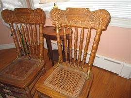 Two of set of 6 Oak Press-back chairs