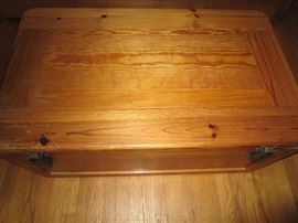 Pink trunk used as coffee table