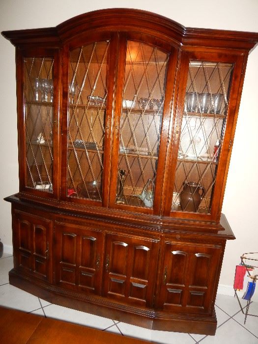 Lighted, glass front China Cabinet.  - 2 pieces, top and bottom
