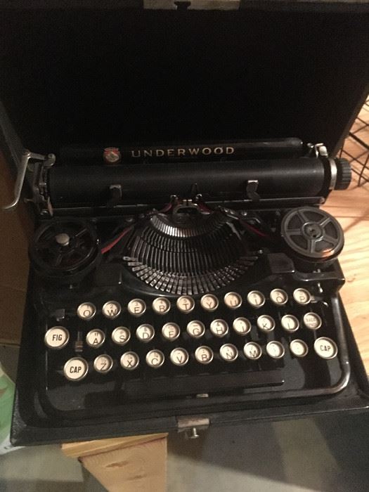 We love this vintage travel Underwood typewriter with carrying case.  In excellent condition.  This would be a perfect addition to your vintage home decor!