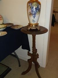 Handpainted porcelain vase and Eastlake stand