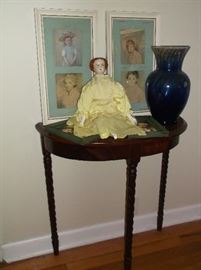 Demi-lune table and porcelain doll