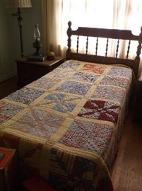 Twin bed w/handmade quilt
