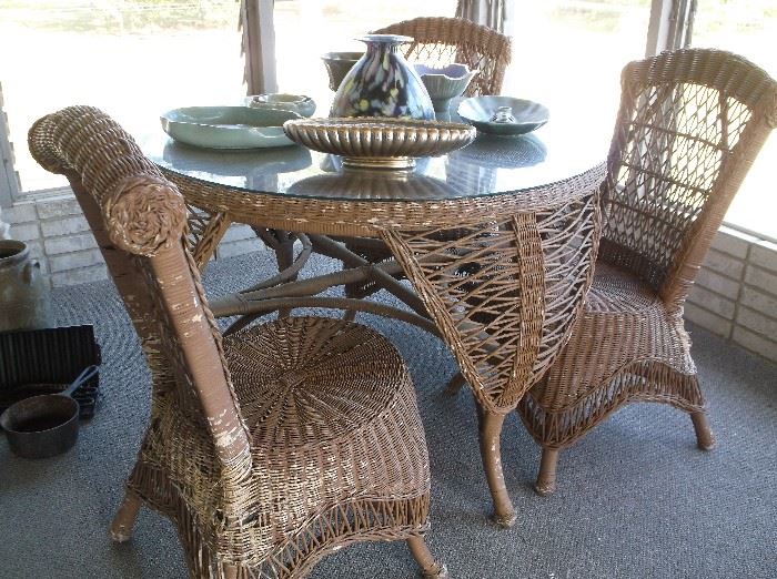 Wicker round table and three chairs